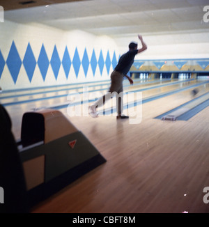 man bowling at alley during 1960s LA southern california Stock Photo