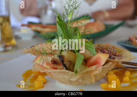 Crispy Duck and Mango Spring Rolls to start at Mom Tri's Boathouse Kata Beach Phuket Thailand Stock Photo