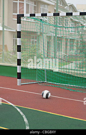 A soccer ball near a soccer goal Stock Photo