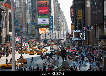 Times Square in New York, crowded with people and traffic Stock Photo