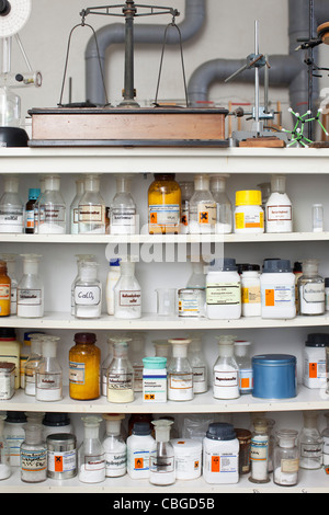 Chemistry classroom, shelves of assorted chemicals and equipment Stock Photo