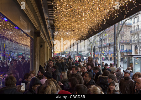 Outside Printemps Department store during Christmas 2011, Paris, France Stock Photo