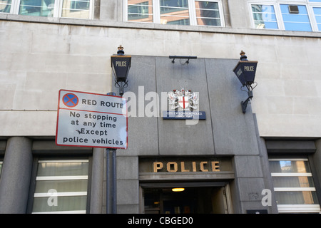 red route sign outside city of london bishopsgate police station london england uk united kingdom Stock Photo