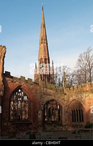 Holy Trinity Church Spire Coventry as seen from the ruins of the old Coventry Cathedral Stock Photo