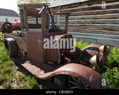 An old rusted Ford truck sits on a farm. Museum of the Mountain West in Montrose, Colorado. Stock Photo