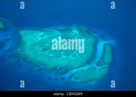 Coral reef near Monuriki Island, Mamanuca Islands, Fiji, South Pacific - aerial Stock Photo