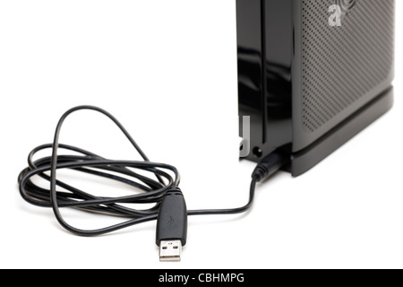 Usb 2.00 cable to USB mini plug plugged in to an upright hard drive Stock Photo