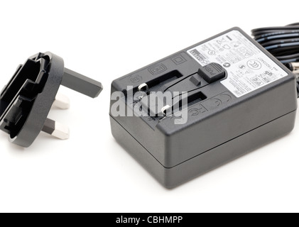 Power supply with removable UK three pin adapter Stock Photo