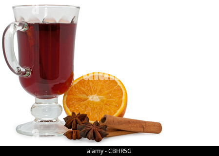 Christmas hot wine with orange, star anise and cinnamon over white background Stock Photo