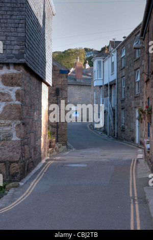 A narrow street in a small town in the coastal region of Cornwall. Stock Photo