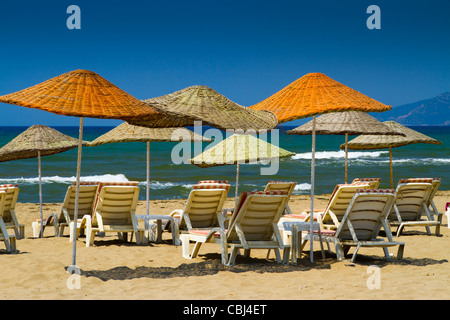 Parasols in Selcuk-Ephesus (Pamucak) beach. Aegean coast. Izmir province. Turkey Stock Photo