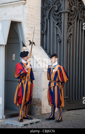 Swiss guards stand in St. Peter's Square as they await the arrival of