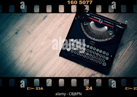 Top view of a vintage typewriter over a wood floor Stock Photo
