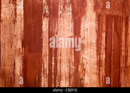 Great background for design works, made from a old orange wall with scratches Stock Photo