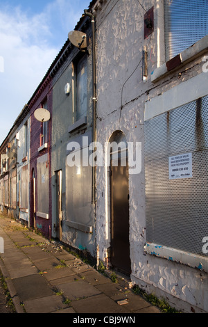 All Items of Value. Rundown Boarded Up, sealed and Empty Terraced Property, house, terrace, architecture, home, in Anfield, Liverpool L5,  UK Stock Photo