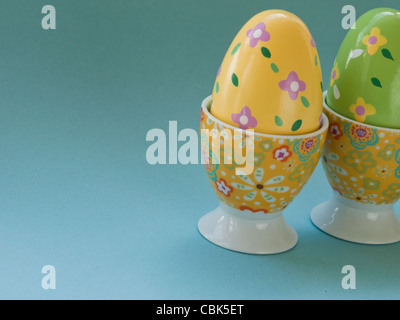 Painted easter eggs in egg cups. Stock Photo