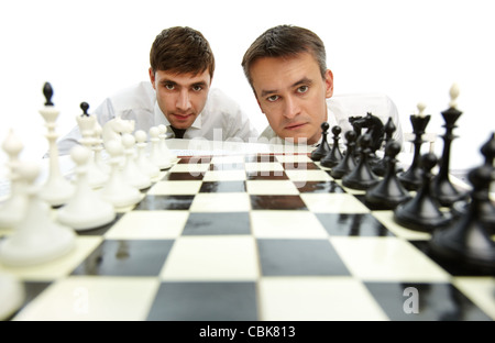 Male chess player with figures in the eyes, thinking process