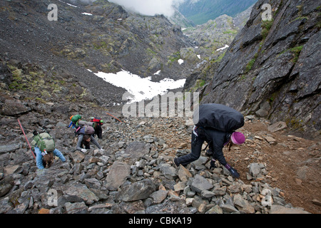 Young women ascending the Golden Stairs. Chilkoot Pass. Chilkoot Trail. Alaska. USA Stock Photo