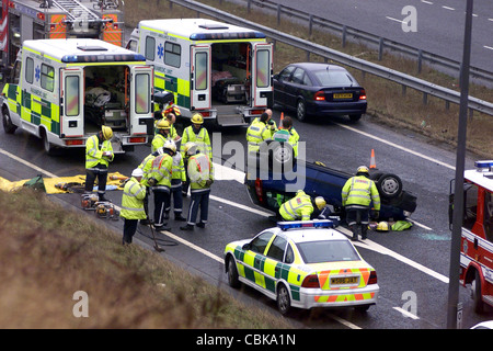 RTA INVOLVING EIGHT CARS ON THE A23 AT PYCOMBE - EMERGENCY SERVICES AT THE SCENE WHERE ONE OF THE CARS HAD OVERTURNED