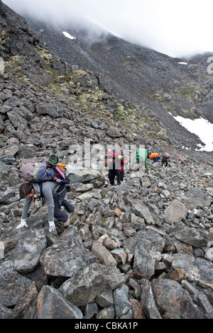 Young women ascending the Chilkoot Pass. Chilkoot Trail. Alaska. USA Stock Photo