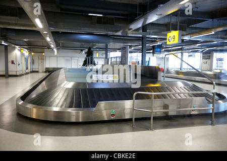 empty luggage carousel heathrow terminal 1 london england united kingdom uk Stock Photo