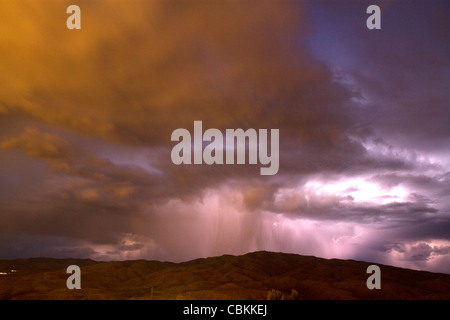 Lightning strikes during a thunderstorm on the first day of summer in Boise, Idaho, USA. Stock Photo