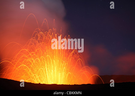 June 2, 2010 - Strombolian eruption on starlit night, Yasur Volcano, Tanna Island, Vanuatu. Stock Photo