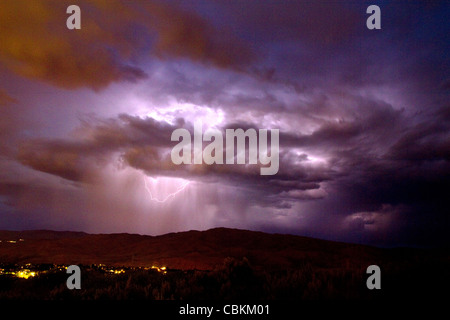 Lightning strikes during a thunderstorm on the first day of summer in Boise, Idaho, USA. Stock Photo