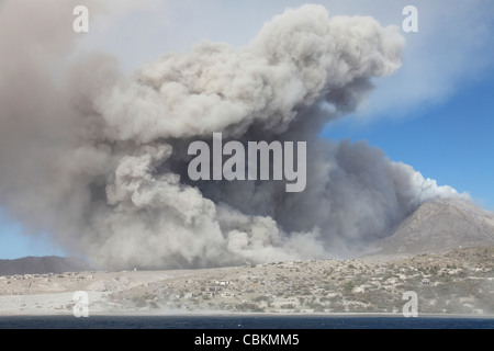 February 1, 2010 - Pyroclastic flow in abandoned city of Plymouth, Soufriere Hills volcano, Montserrat, Caribbean. Stock Photo