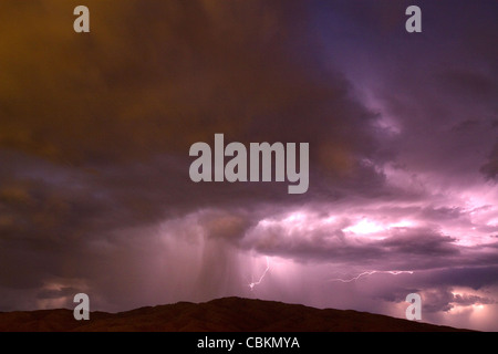 Lightning strikes during a thunderstorm on the first day of summer in Boise, Idaho, USA. Stock Photo