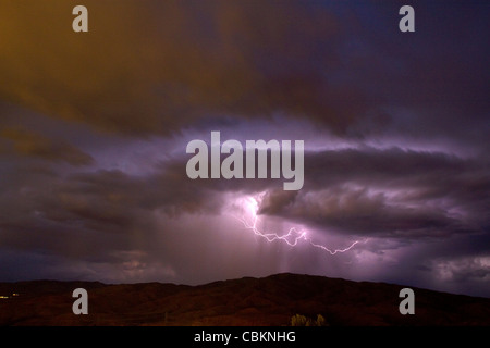 Lightning strikes during a thunderstorm on the first day of summer in Boise, Idaho, USA. Stock Photo