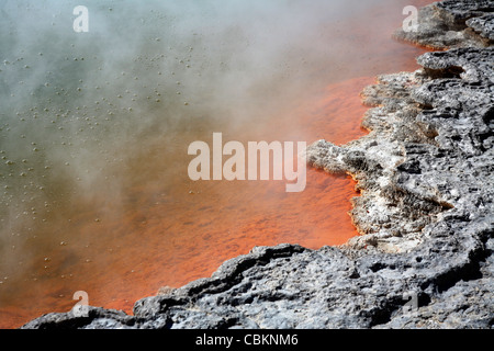November 2007 - Bubbles rising in Champagne Pool hot spring, Wai-O-Tapu Geothermal area, Taupo Volcanic Zone, New Zealand. Stock Photo