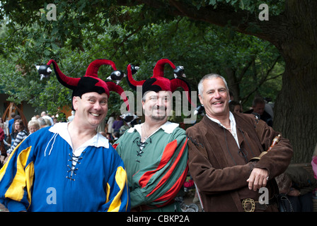 Two fools on the medieval festival Stock Photo - Alamy