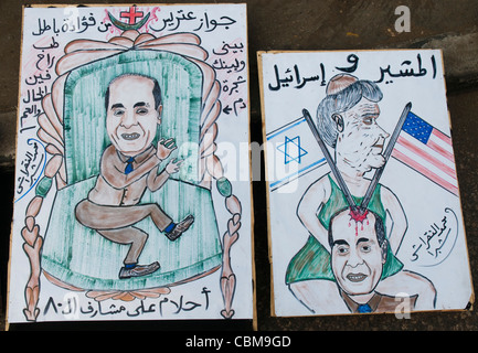 Hand-drawn posters displayed at a demonstration by Muslim Brotherhood supporters in Tahrir Square, Cairo, on 18 November 2011 Stock Photo