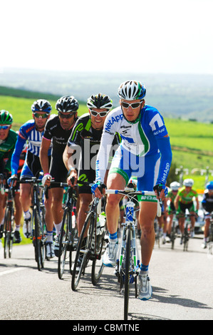 breakaway on the Tour of Britain cycle race, as team attacks on climb on the staffordshire moorlands Stock Photo
