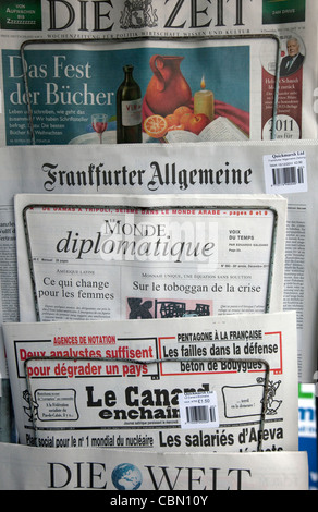 German and French newspapers on sale in London Stock Photo