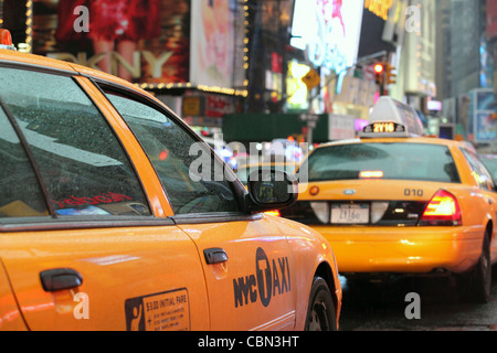 Yellow Taxi Cabs queuing in heavy traffic, Times Square, New York City, NY, USA Stock Photo