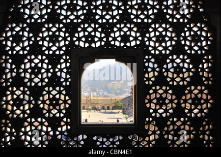 Intricate lattice work of the windows in the decorative Ganesh Pol gateway inside the Amber Palace,India Stock Photo