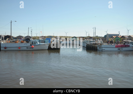 Commercial fishing boats sit in the working harbor of North Lake, Prince Edward Island, Canada. Stock Photo