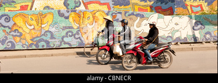 Ceramic Mosaic Mural  on dyke wall in Hanoi Vietnam Stock Photo