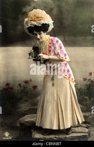 Woman Photographer Holding Vintage Folding Camera Stock Photo