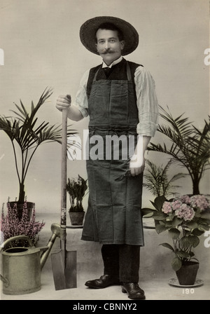 Gardener Proudly Displaying Array of Plants Stock Photo