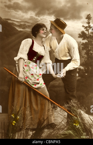 Attractive Young Peasant Couple in the Alps Stock Photo