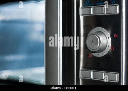 details of modern microwave oven in the kitchen Stock Photo