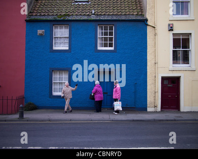 Blue House with People, Anstruther, Fife, Scotland Stock Photo
