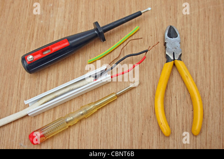 Electricians tools with wiring. Stock Photo