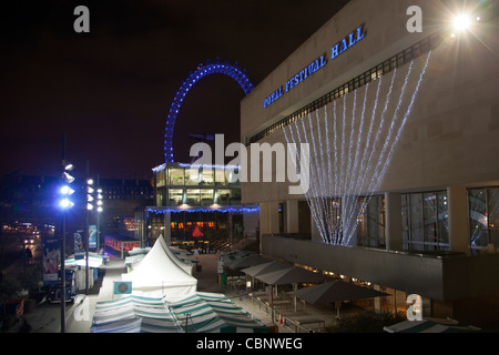 Royal Festival Hall and the London Eye at night, Southbank Centre London, UK. Stock Photo