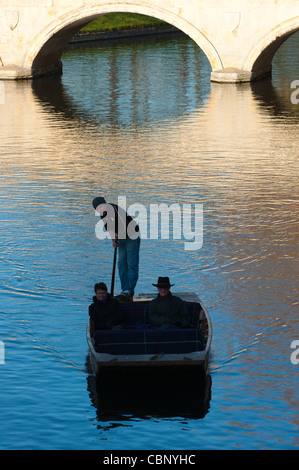 Punting silhouette on river Cam, Cambridge England. Stock Photo