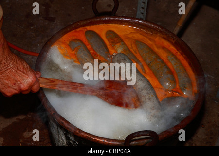 Freshly made sausages being cooked in water, Ibiza traditional pig slaughter Stock Photo