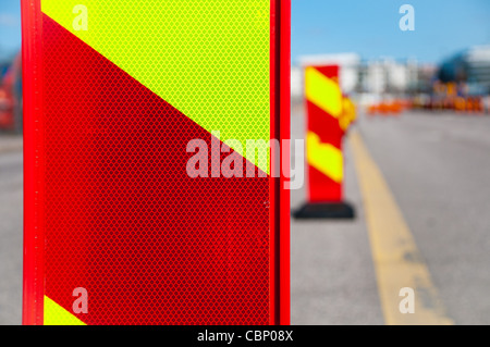 red and yellow traffic detour signs on the road Stock Photo